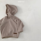 Cozy beige Monica Hoodie with waffle texture, perfect for babies and toddlers by Bebeholic. Stylish and functional.