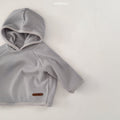 Stylish Monica Hoodie in soft gray waffle texture, perfect for babies and toddlers by Bebeholic.