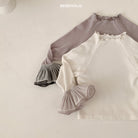 Stylish Double Frill Tee from Bebeholic, featuring soft fabric and delicate ruffles for baby comfort and style.