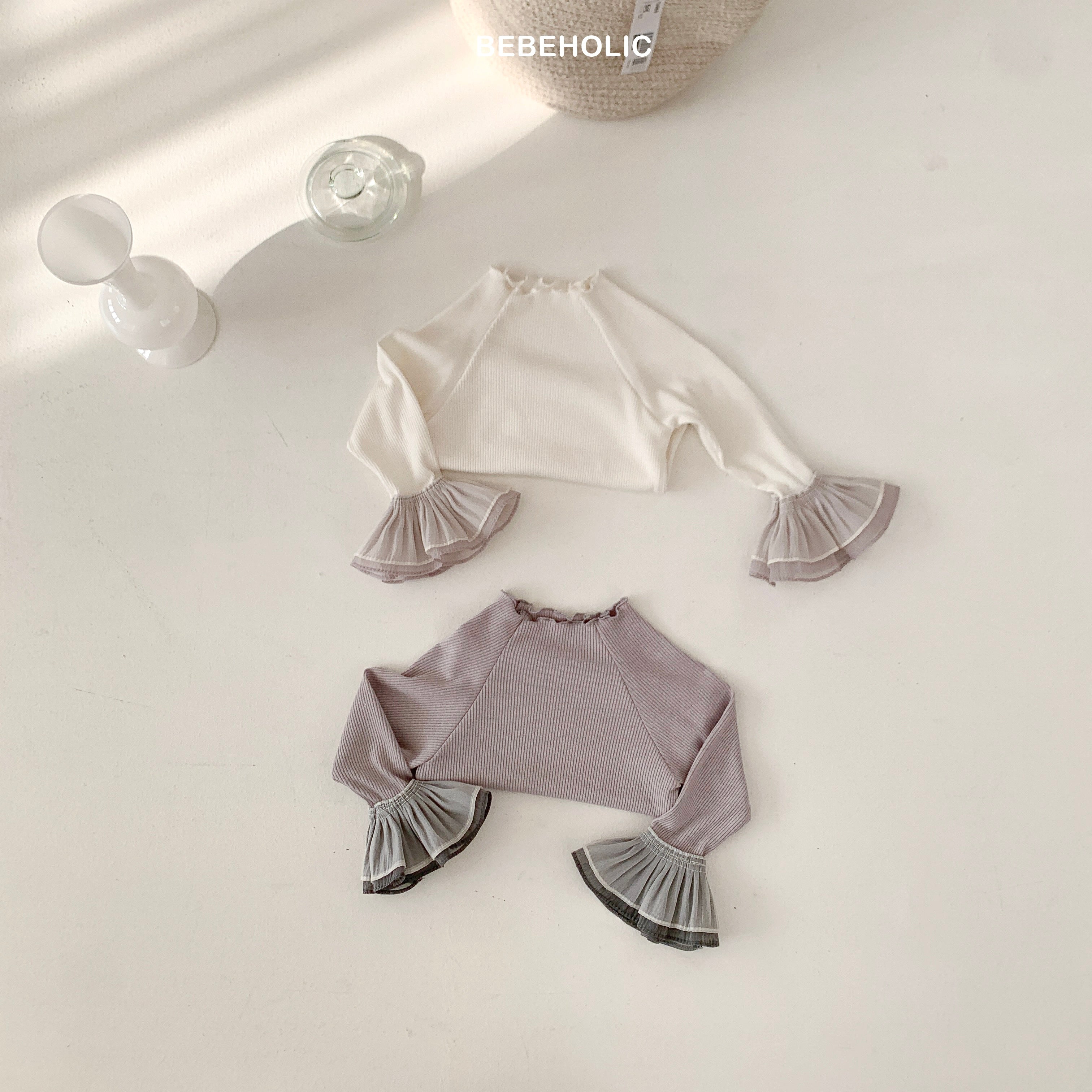 Stylish Double Frill Tee from Bebeholic features soft ruffles and ribbed cotton for baby comfort and freedom of movement.
